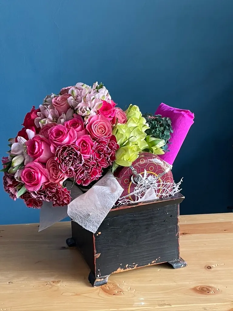Florist arranging flowers by hand